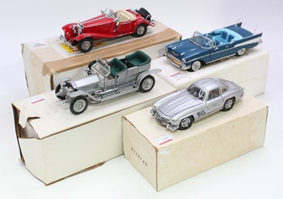 Lot 889 - A collection of four various boxed 1/24 scale...