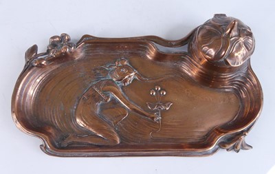 Lot 1187 - An Art Nouveau copper inkstand, of sinuous...