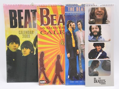Lot 193 - A collection of assorted Beatles calendars,...