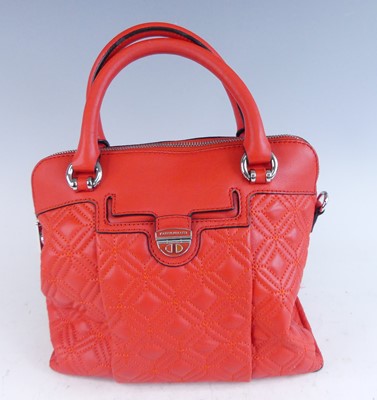 Lot 1176 - Karen Millen - a red leather handbag, having...