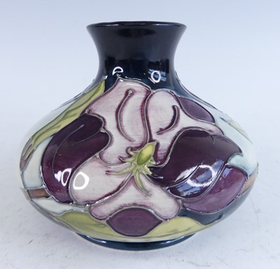 Lot 1022 - A contemporary Moorcroft pottery squat vase in...