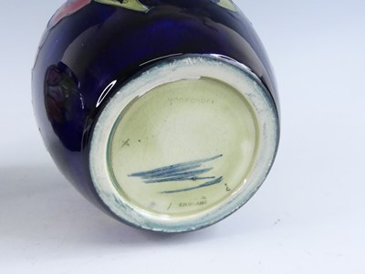 Lot 1030 - A Moorcroft Hibiscus pattern pottery ginger...