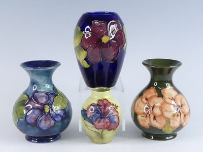 Lot 1024 - A Moorcroft Clematis pattern pottery vase, of...