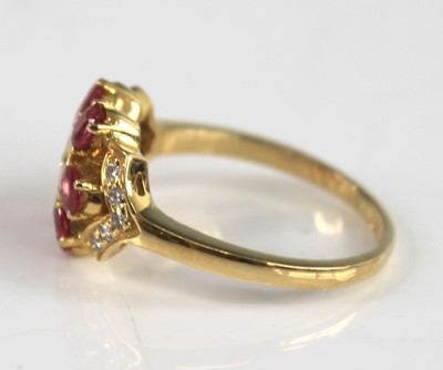 Lot 2244 - A yellow metal ruby and diamond ring and...