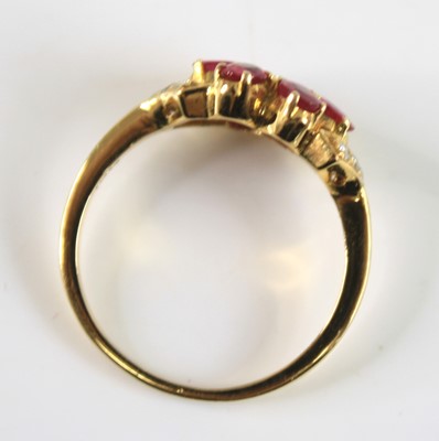 Lot 2244 - A yellow metal ruby and diamond ring and...