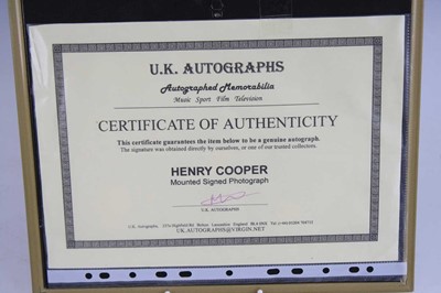 Lot 412 - Boxing, Sir Henry Cooper, a 20 x 25cm black...