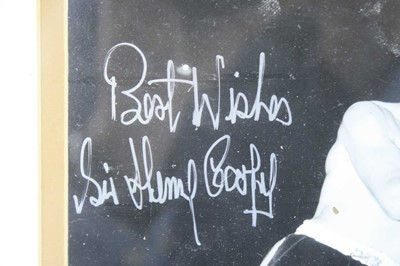 Lot 412 - Boxing, Sir Henry Cooper, a 20 x 25cm black...