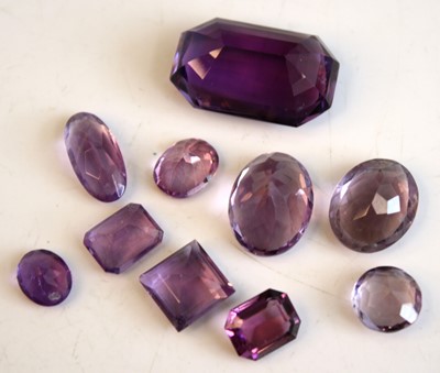 Lot 2522 - A collection of loose vari-cut amethyst stones,...