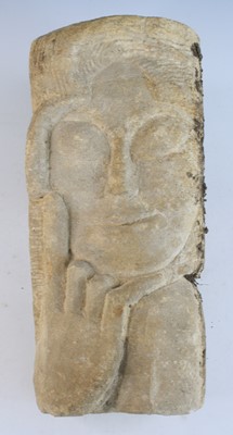 Lot 2325 - A sandstone corbel, carved as a serene face...