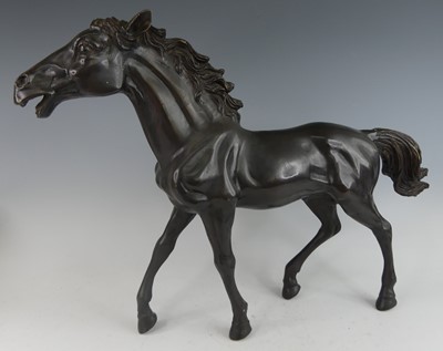 Lot 1203 - A contemporary bronzed metal model of a wild...