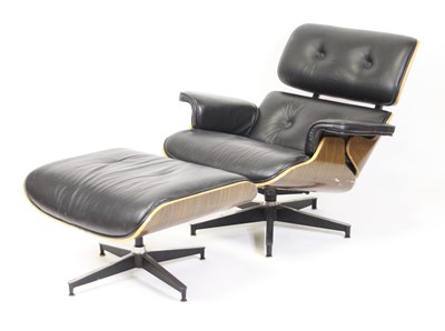 Lot 1432 - After Charles and Ray Eames - a plywood and...