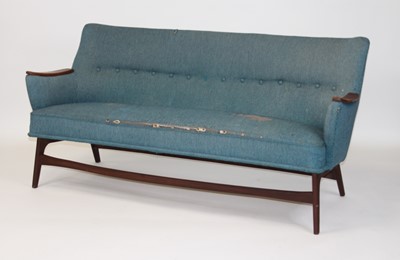 Lot 1368 - A 1950s Danish three-seater sofa, having teak...