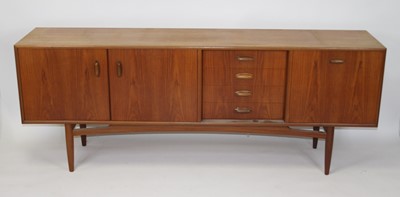 Lot 1350 - Ernest Gomme for G-plan - a 1960s teak long...