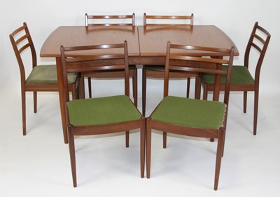 Lot 1348 - Ernest Gomme for G-plan - a 1960s teak dining...