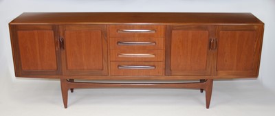 Lot 1355 - A 1960s G-plan "Fresco" teak long sideboard,...