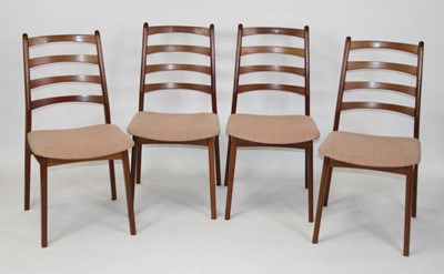 Lot 1406 - A set of four 1960s teak ladder back dining...