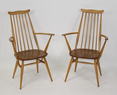 Lot 1390 - A pair of Ercol light elm Goldsmith dining...