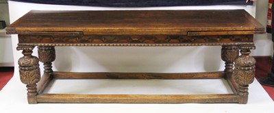 Lot 2511 - An antique oak drawleaf refectory table in the...