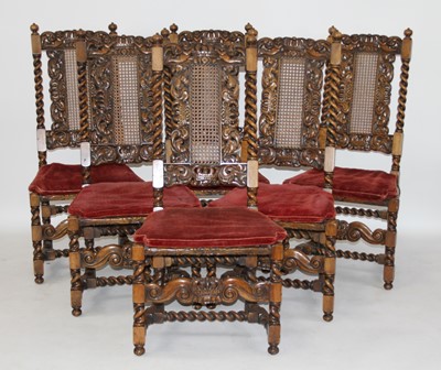 Lot 2482 - A set of eight walnut dining chairs in the...