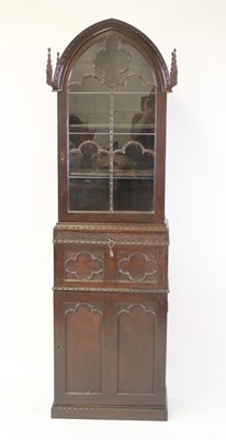 Lot 2516 - A Victorian Gothic Revival oak secretaire...