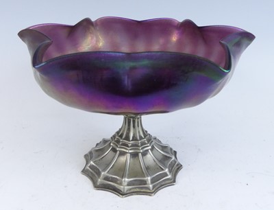 Lot 1093 - An early 20th century iridescent glass footed...