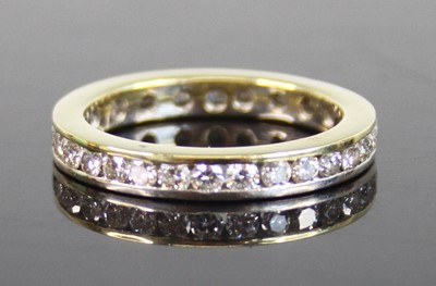 Lot 2269 - A yellow and white metal diamond full eternity...