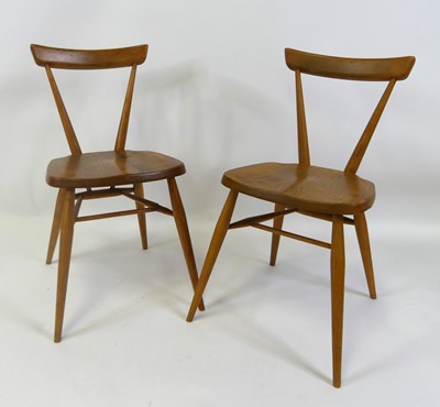 Lot 1397 - A pair of 1960s Ercol blond elm bar back...