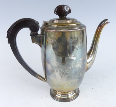 Lot 1143 - An Art Deco silver coffee pot having a...