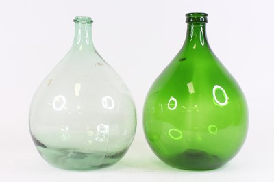 Lot 10 - A near pair of glass carboys, height 36cm