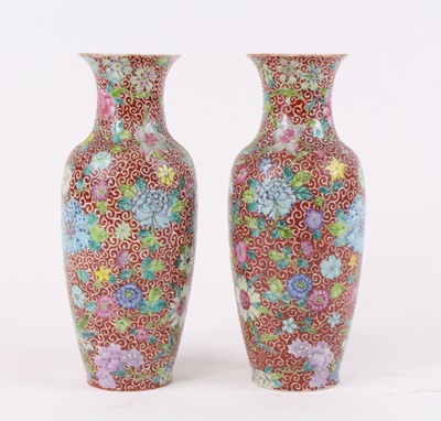 Lot 24 - A pair of Chinese porcelain vases, each enamel...