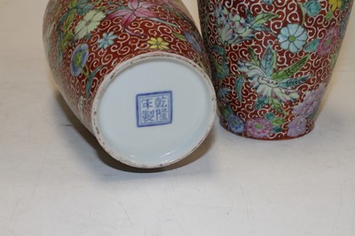 Lot 24 - A pair of Chinese porcelain vases, each enamel...