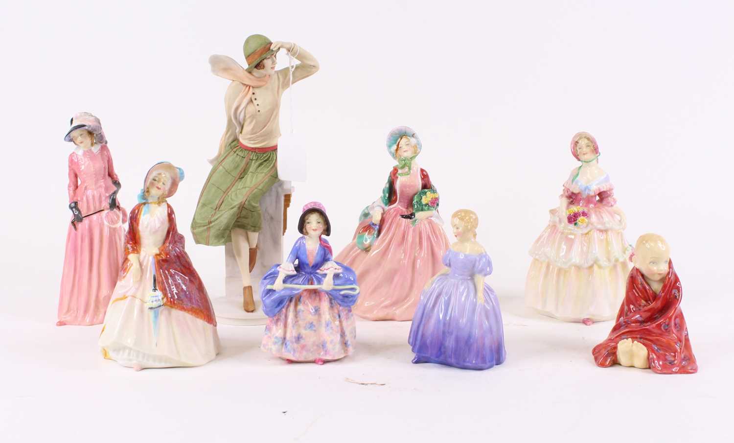 Lot 64 - A collection of eight Royal Doulton figures of...