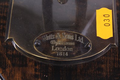 Lot 17 - A reproduction Watts & Sons Ltd opticians...