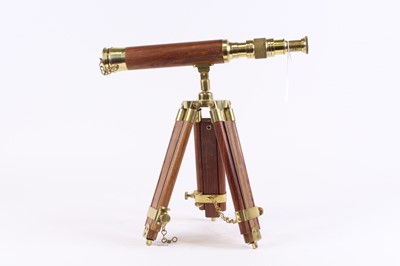 Lot 16 - A brass and hardwood tripod telescope