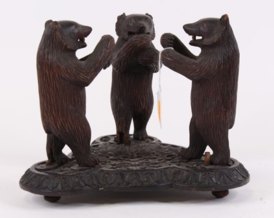 Lot 29 - An early 20th century Black Forest carved wood...