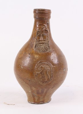 Lot 34 - An 18th century German stoneware Bartmann jug,...