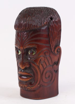 Lot 37 - A New Zealand Maori carved hardwood portrait...