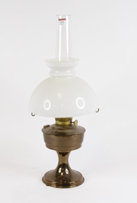 Lot 116 - A Victorian brass oil lamp, having a milk...