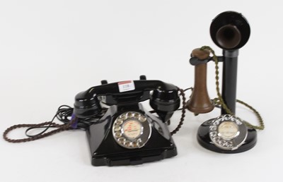 Lot 118 - A vintage bakelite rotary telephone; together...