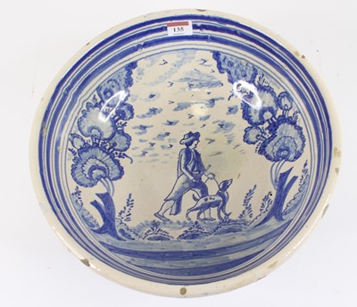 Lot 135 - A French blue and white faience bowl,...