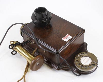 Lot 153 - A vintage style oak cased rotary telephone