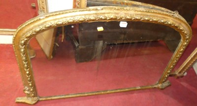 Lot 1117 - A Victorian giltwood arched overmantel mirror,...