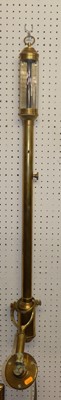 Lot 1123 - A lacquered brass gimballed marine barometer,...