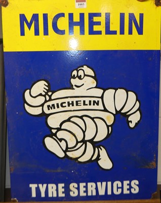 Lot 1003 - An enamel advertising sign for Michelin Tyre...