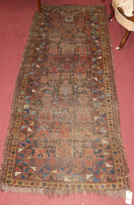 Lot 1142 - A Turkish woollen hall rug, geometric floral...