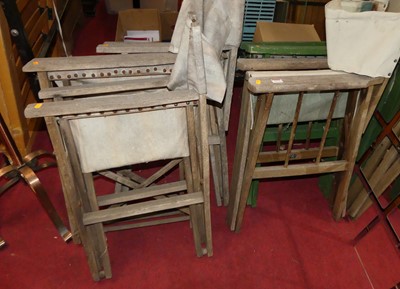 Lot 1173 - A collection of five teak folding director's...