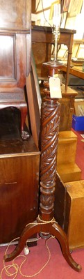 Lot 1179 - A floral carved spiral turned mahogany...