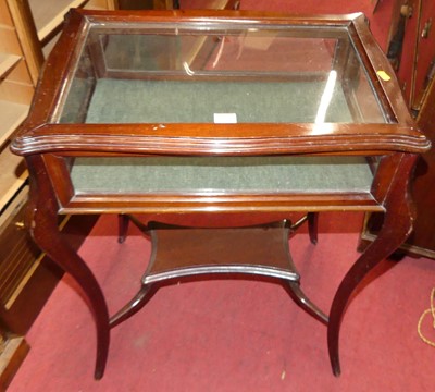 Lot 1180 - An early 20th century stained walnut glazed...