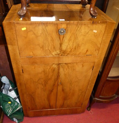 Lot 1187 - An Art Deco figured walnut drinks cabinet,...