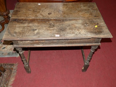 Lot 1220 - An antique joined oak plank top side table,...